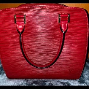 Louis Vuitton  Red Epi leather bag.